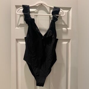 Jcrew black one piece size 10, never worn.